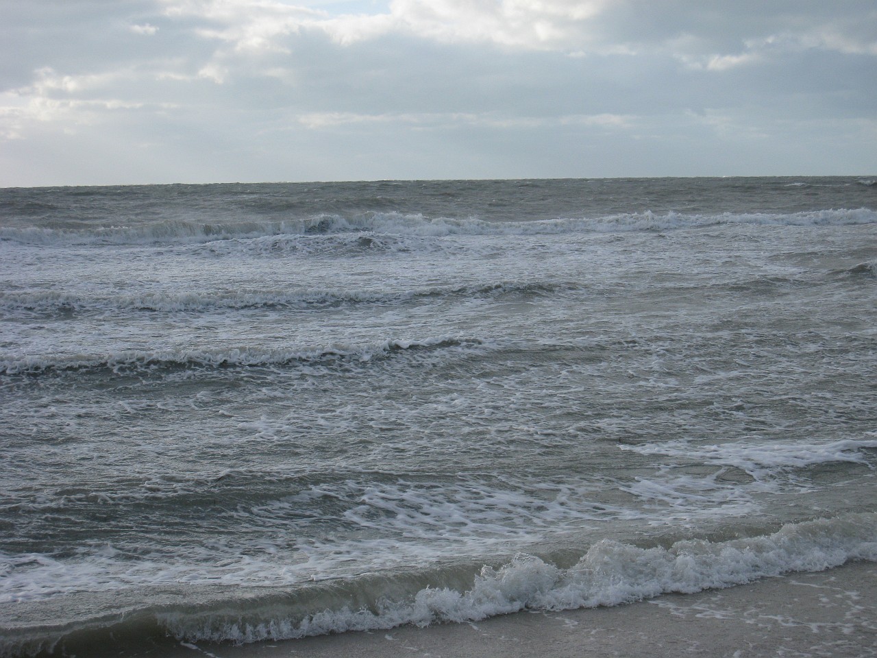 Vacation 2007-12 - Sanibel Island 0082.jpg - Our vacation for 2007-08 to Florida included a side trip to Sanibel Island. The main attraction here is "shelling", known as "The Sanibel Stoop" named for people bending over to pick up shells. It was a cold and blustery day at best!